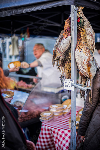 Pheasants and pies for sale at Borough Market, London Borough of Southwark, London, England, United Kingdom photo