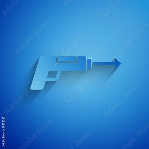 Paper cut Fishing harpoon icon isolated on blue background. Fishery manufacturers for catching fish under water. Diving underwater equipment. Paper art style. Vector