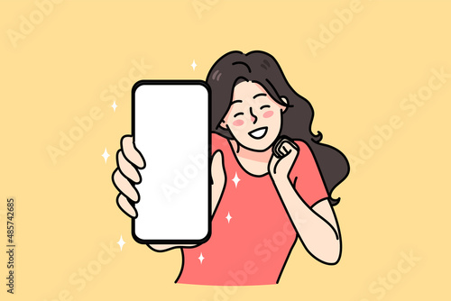 Overjoyed young woman show cellphone with blank mockup screen excited about good news online. Smiling girl demonstrate smartphone, win lottery or get great deal or sale. Vector illustration. 