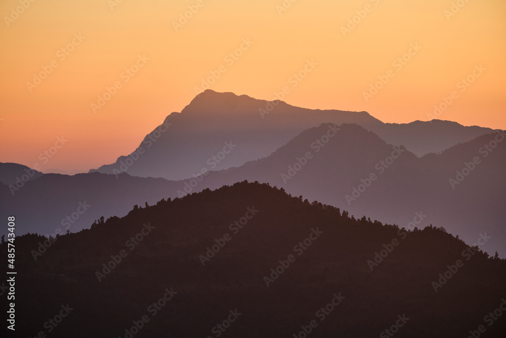 Bright orange sunset in the mountains