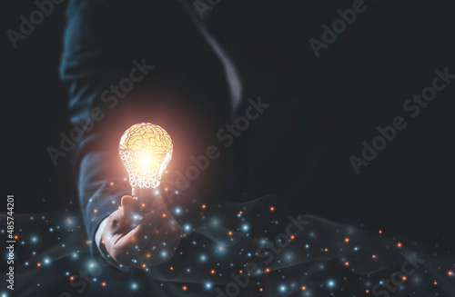 woman holding Light bulbs with Brain and gears inside and Low poly wireframe outside and connection line Creative and innovation inspiration. Business Bright idea concept.