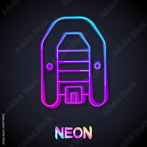 Glowing neon line Inflatable boat with outboard motor icon isolated on black background. Vector