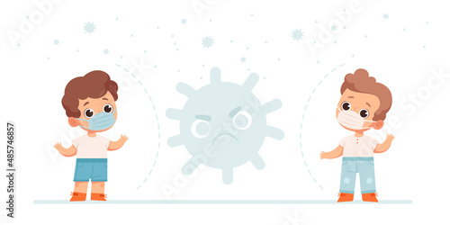 Little boys wearing medical masks keep social distance during the covid-19 pandemic. The concept of observing measures to protect children from coronavirus