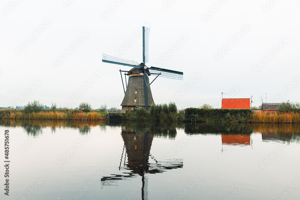 Aerial view of traditional windmills at sunset in Kinderdijk  Netherlands UNESCO heritage site 
