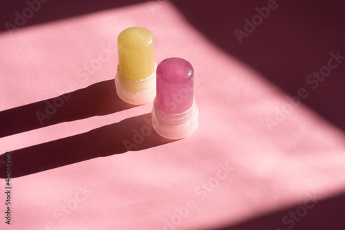 Ecological stick deodorant antiperspirant made of alunite on a pink background. Eco friendly deodorant made from alunite stone. 