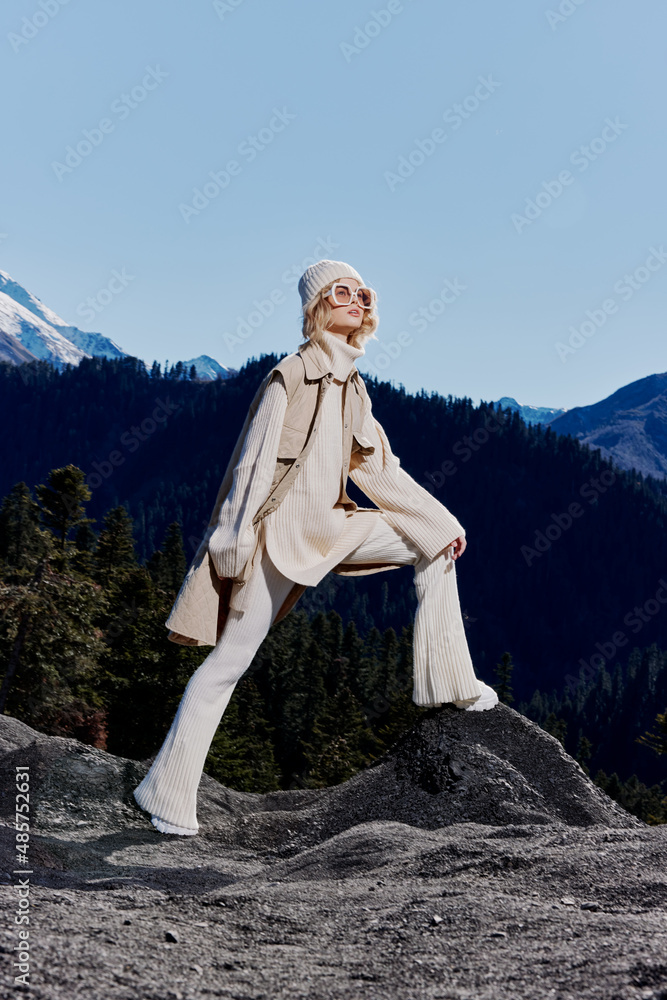young woman fashion glasses mountain top nature freedom relaxation young woman fashion glasses mountain top nature freedom relaxation
