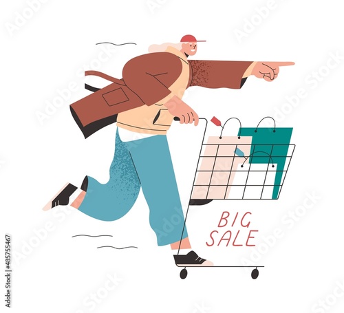 Buyer with shopping cart and bags, rushing for big sale. Happy shopper with purchases in trolley. Customer running, pointing with forefinger. Flat vector illustration isolated on white background