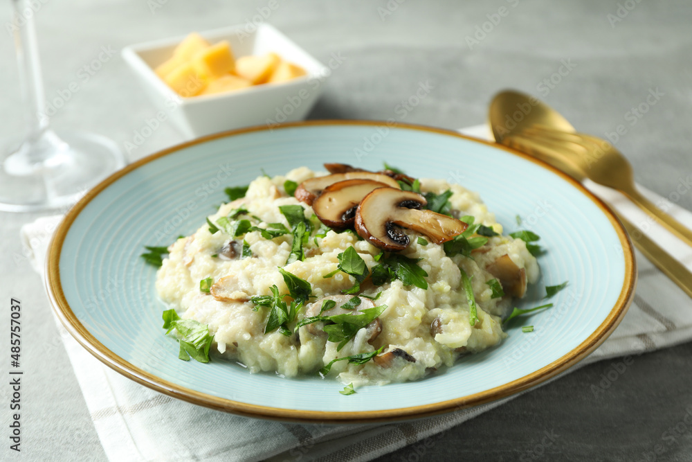 Concept of tasty food with risotto with mushrooms, close up