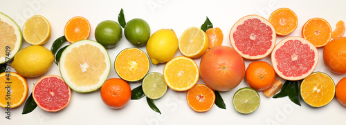 Fényképezés Different citrus fruits on white background, top view