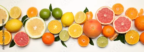 Obraz  z motywem Different citrus fruits on white background, top view