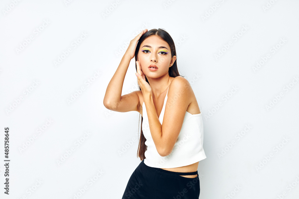 beautiful brunette white t shirt hand gestures charm light background unaltered beautiful brunette white t shirt hand gestures charm light background unaltered