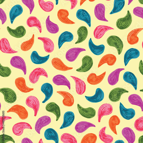Colorful teardrops pattern on a yellow background seamless repeat pattern