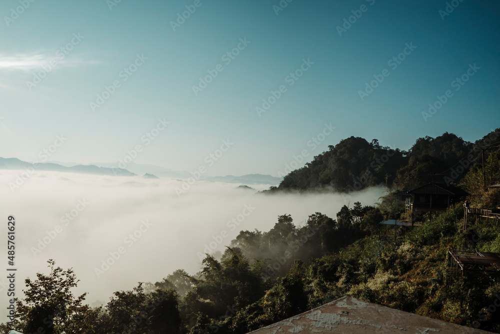 Beautiful view with sunlight and sea of fog