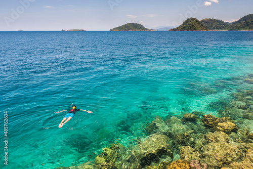 Snorkeling at Twin Beach, a tropical, white sandy beach near Padang in West Sumatra, Indonesia, Asia, background with copy space