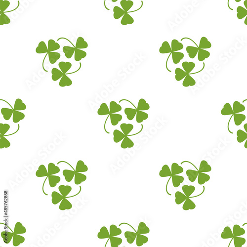 Seamless shamrock background with green leaves on white background. St Patrick day vector illustration.