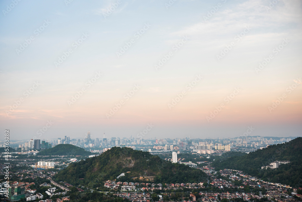 Kuala Lumpur skyline seen at sunrise from Bukit Tabur Mountain, Malaysia, Southeast Asia