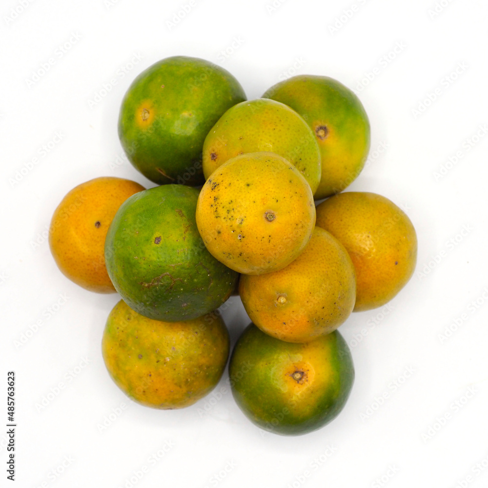 pile of organic tangerine on white background.