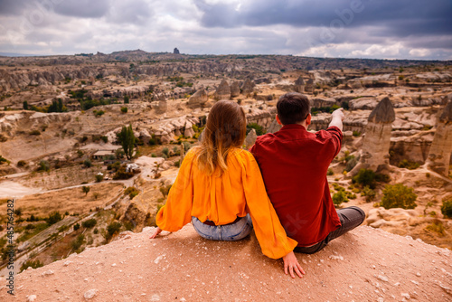 Young couple on hill in Cappadocia 