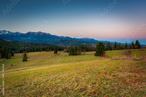 Beautiful sunrise on the meadow under the Tatra Mountains at autumn. Poland