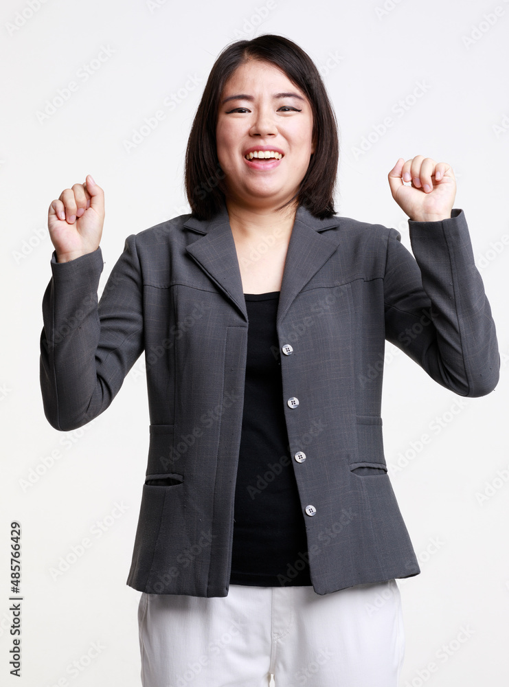 Portrait studio isolated cutout closeup shot Asian young successful professional female businesswoman entrepreneur in formal suit with eyeglasses standing smiling look at camera on white background Portrait studio isolated cutout closeup shot Asian young successful professional female businesswoman entrepreneur in formal suit with eyeglasses standing smiling look at camera on white background
