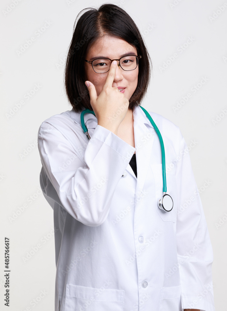 Portrait studio isolated cutout closeup shot of Asian professional successful female doctor in lab coat with stethoscope smiling look at camera holding hand adjusting eyeglasses on white background Portrait studio isolated cutout closeup shot of Asian professional successful female doctor in lab coat with stethoscope smiling look at camera holding hand adjusting eyeglasses on white background