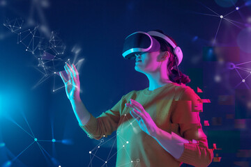 Woman with VR virtual reality goggles