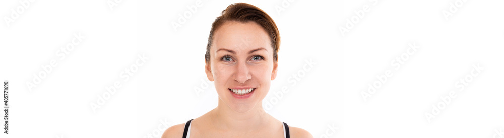 young woman with a smile with snow-white teeth looking at the camera on a white background young woman with a smile with snow-white teeth looking at the camera on a white background
