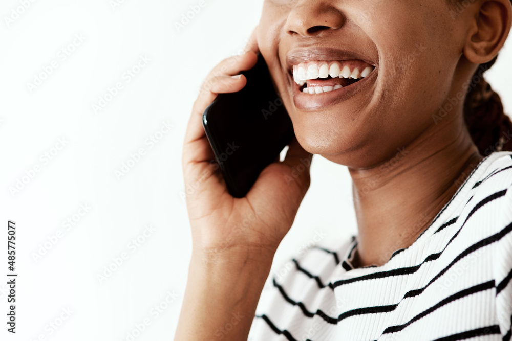 Connectivity has never been more important than now. Cropped shot of a woman using a smartphone against a white studio background. Connectivity has never been more important than now. Cropped shot of a woman using a smartphone against a white studio background.