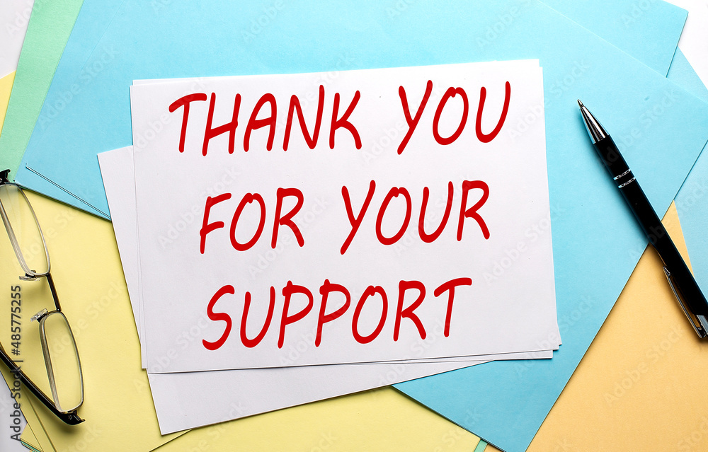 THANK YOU FOR YOUR SUPPORT text on paper on colorful paper background THANK YOU FOR YOUR SUPPORT text on paper on colorful paper background