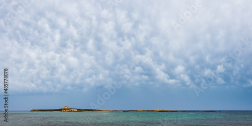 Panoramic photo of Capo Passero Island (Isola di Passero) at Portopalo di Capo Passero, the South Eastern most tip of Sicily, Italy, Europe photo