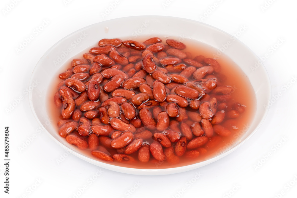 Red kidney beans soaked in water in bowl before cooking Red kidney beans soaked in water in bowl before cooking