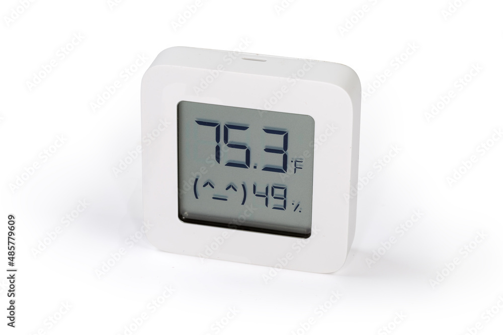 Digital indoor mini thermometer with hygrometer on a white background Digital indoor mini thermometer with hygrometer on a white background