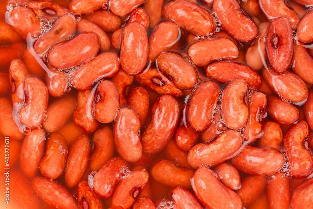 Red kidney beans soaked in water before cooking, top view Red kidney beans soaked in water before cooking, top view