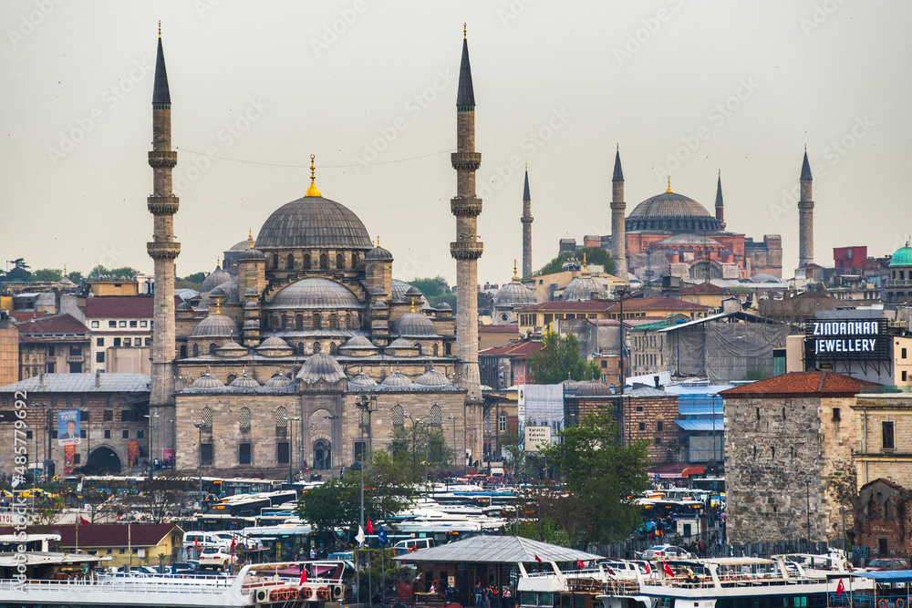Fototapeta premium New Mosque (Yeni Cami) with Hagia Sophia (Aya Sofya) behind, Istanbul, Turkey, Eastern Europe