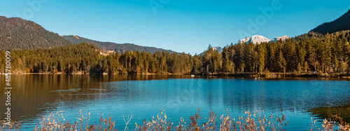 Beautiful alpine autumn view with reflections at the famous Hintersee lake near Berchtesgaden, Bavaria, Germany