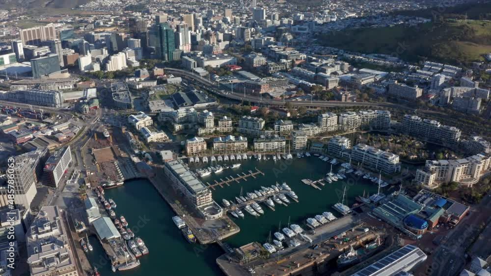 Aerial shot tracking sideways high above the marina of Cape Town's waterfront. Aerial shot tracking sideways high above the marina of Cape Town's waterfront.