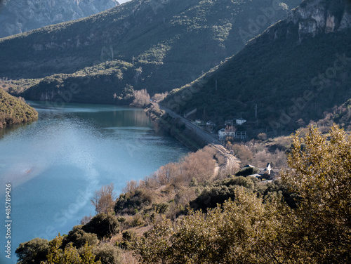 View of the Serra da Encina da Lastra natural park, the Penarrubia reservoir surrounded by mountains and the Covas train station next to the town of Cobas de Valdeorras photo