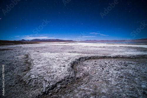 Stars over Chalviri Salt Flats at night (aka Salar de Chalviri), Altiplano of Bolivia, South America