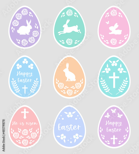 Easter eggs stickers with flowers, bunny, religious cross and text. Easter sticker set in pastel colors. 
