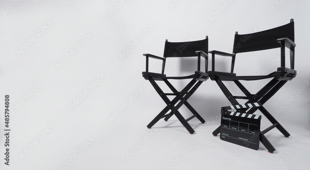 Two Black director chair and clapperboard on white background. Two Black director chair and clapperboard on white background.