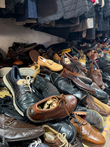 Used clothes and shoes in a second hand shop in Morocco