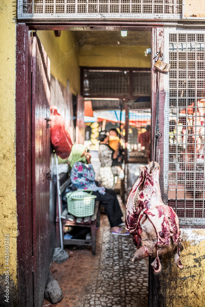 Cows head at a butchers stall in Berastagi (Brastagi) Market, North Sumatra, Indonesia, Asia