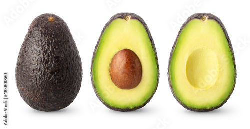 Isolated avocados. Whole black avocado fruit, half with seed and a half without isolated on white background with clipping path