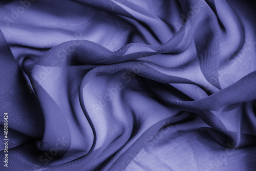 The purple texture of the pleated fabric. Pink georgette fabrics.