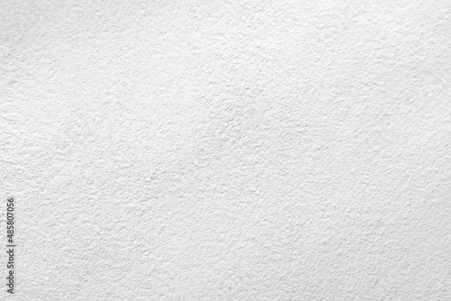 Seamless texture of white cement wall a rough surface, with space for text, for a background... © Sittipol 