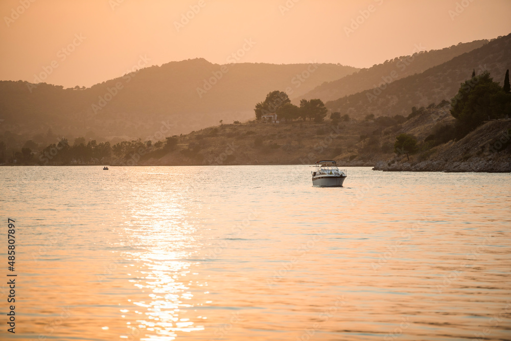 Motor boat at sunset, Ermioni, Peloponnese, Greece