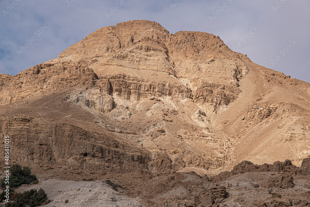 Closeup view of Mount Yishai, towering 190 m above Nahal David canyon entrance, Ein Gedi National Park and Nature Reserve, Dead Sea, Judean Desert, Israel	