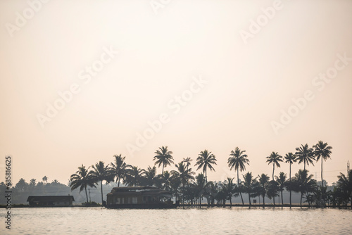 Houseboat in the backwaters near Alleppey, Alappuzha, Kerala, India photo