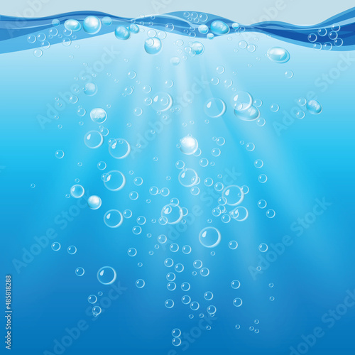 underwater bubbles in rays of light