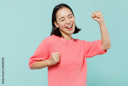 Fotografija Young overjoyed happy excited woman of Asian ethnicity 20s wear pink sweater do
